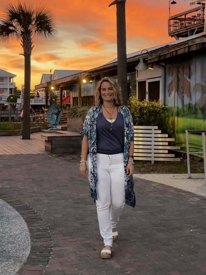 Jessica English walking outdoors at sunset